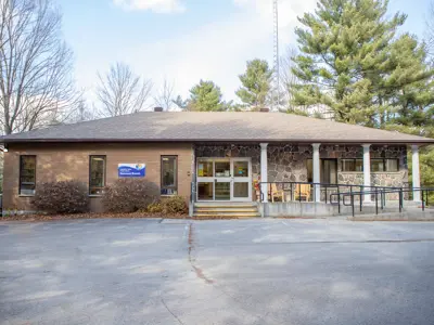 Outside the Kinmount branch - stone and brick bulding with wheelchair ramp