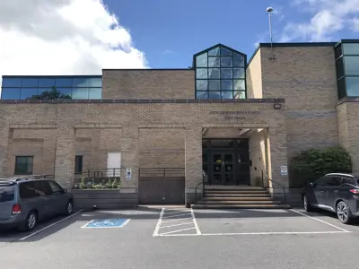 Outside view of the Lindsay Service Centre with parking lot in front